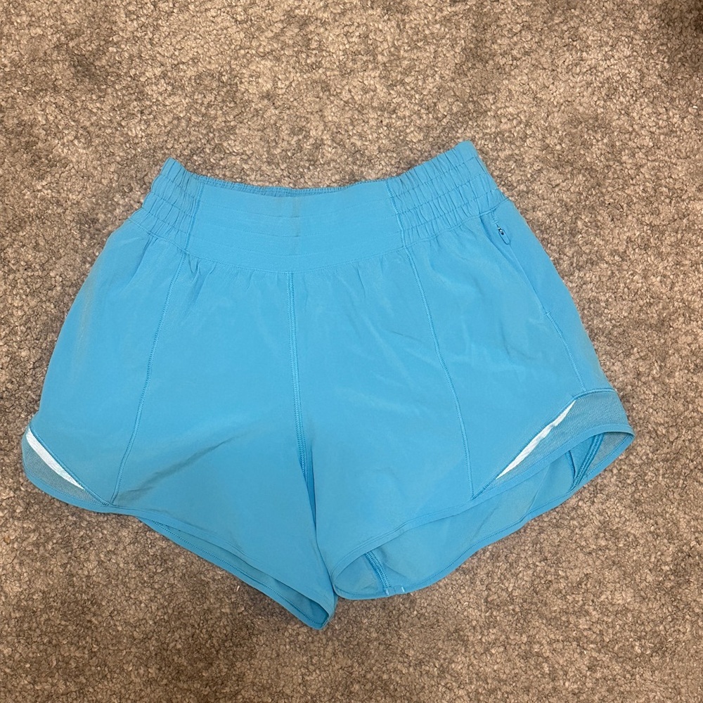 Lululemon Sheer Blue Hotty Hots 4” size 4